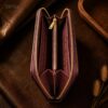 Tannor Irodori hand-woven cowhide long wallet in Burgundy, open interior showing the card slots