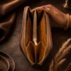 Tannor Irodori hand-woven cowhide long wallet in Cognac, front angled view of the woven panel