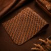 Tannor Irodori hand-woven cowhide long wallet in Cognac, close-up of the hand-woven leather texture