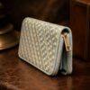 Tannor Irodori hand-woven cowhide long wallet in Cerulean, standing diagonal view with the zip open