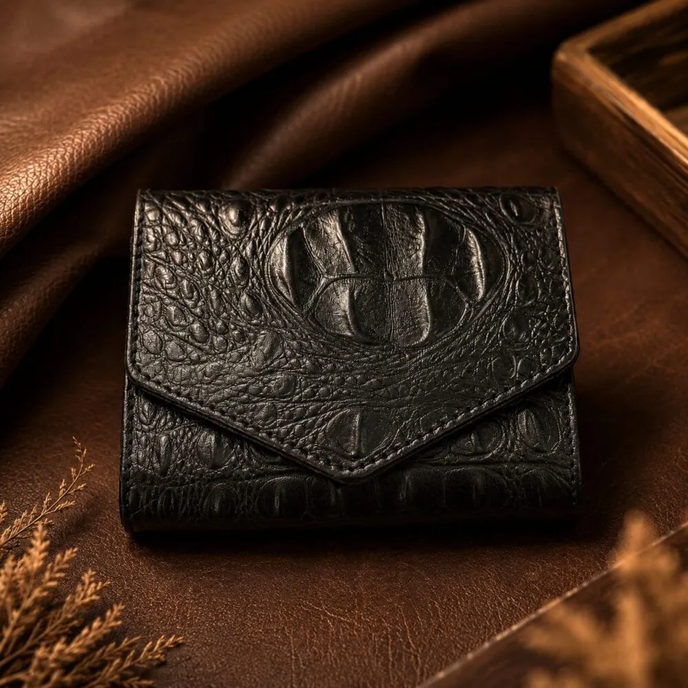 Tannor crocodile-embossed leather envelope wallet in black, front view