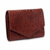Tannor crocodile-embossed leather envelope wallet in chocolate brown, side profile showing the slim depth