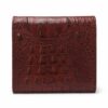 Tannor crocodile-embossed leather envelope wallet in chocolate brown, close-up of the embossed leather grain